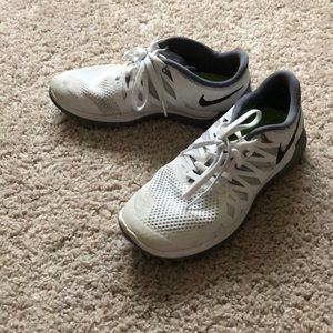 White and gray Nike Free 5.0 sneakers